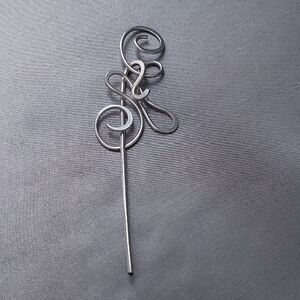 Elegant Silver Swirl Brooch